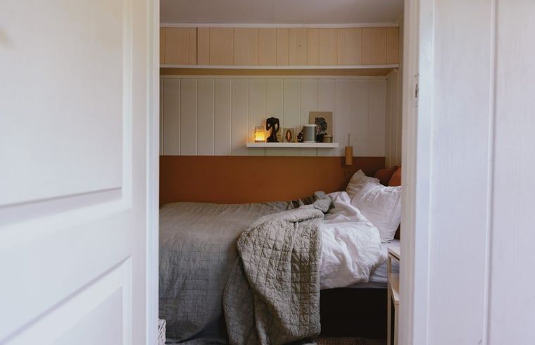 Knusse slaapkamer in Huisje in Maarn, vakantiehuis op de Utrechtse Heuvelrug.