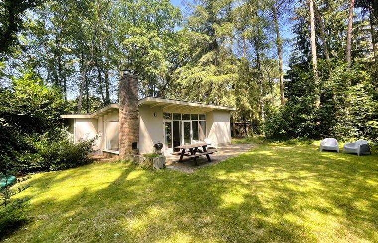 Vacation home in Maarn, Utrecht Hill Ridge, with sunny garden surrounded by wooded area.