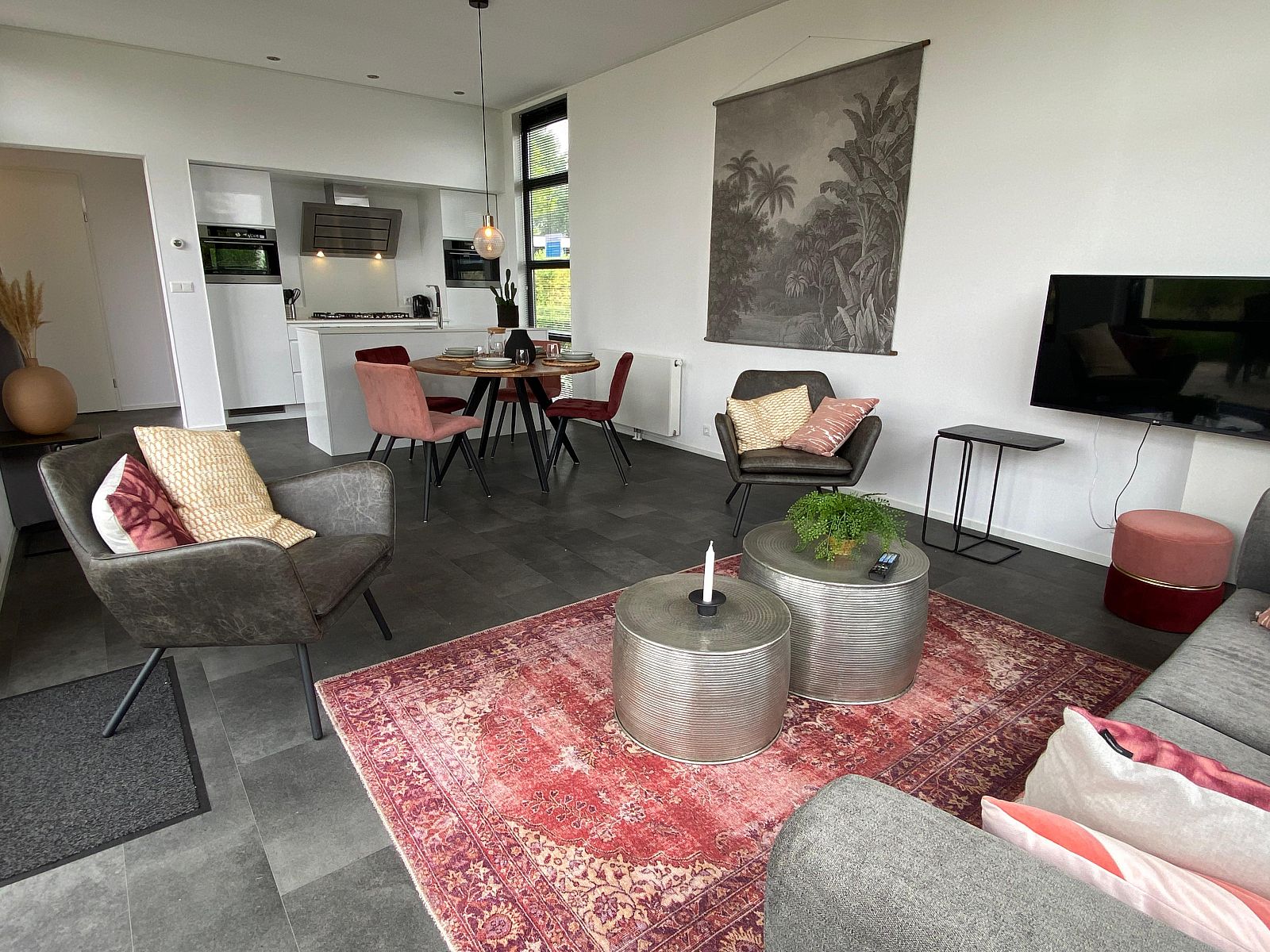 Stylish living room of Chalet in Maarn, Utrechtse Heuvelrug, with modern furnishings and comfortable seating area.