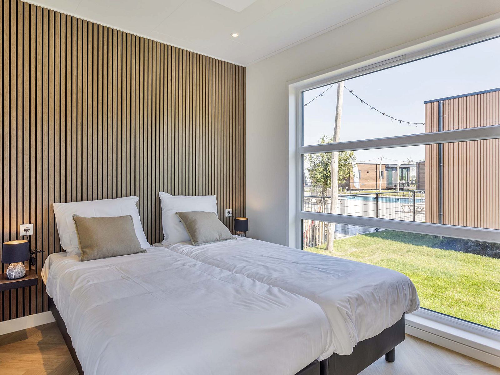 Slaapkamer met tweepersoonsbed in Tiny house 3 persoons, Lexmond, Utrecht.