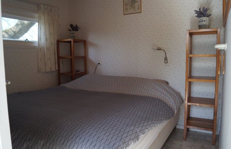 Bedroom of Huisje in Zegveld, vacation home in Zegveld, Utrecht. Comfortable and cozy bedroom for a relaxing stay.