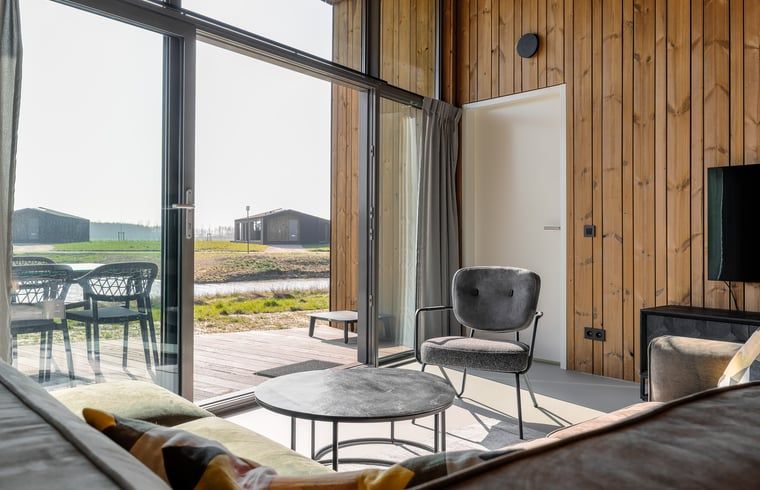 Modern living room in Cottage in Wissenkerke, located in Wissenkerke, North Beveland, Zeeland.