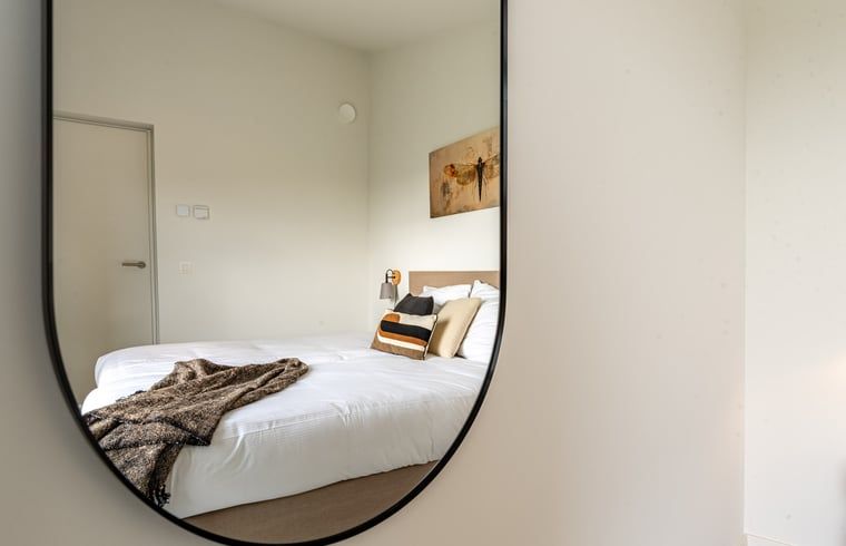 Stylish bedroom with art in Holiday home in Wissenkerke, Noord-Beveland, Zeeland.