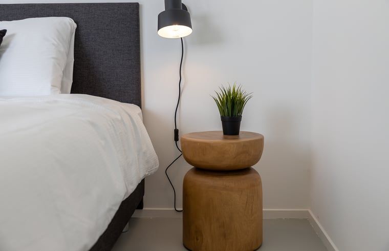 Moderne Kueche des Ferienhauses in Wissenkerke mit Essecke, ideal fuer einen Urlaub in Noord-Beveland, Zeeland.