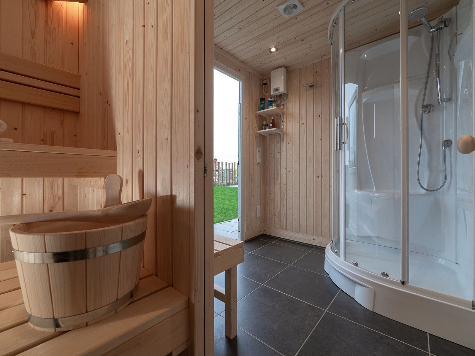 Modern sauna and shower in Holiday Home Ganuenta, Colijnsplaat, North Beveland for ultimate relaxation.