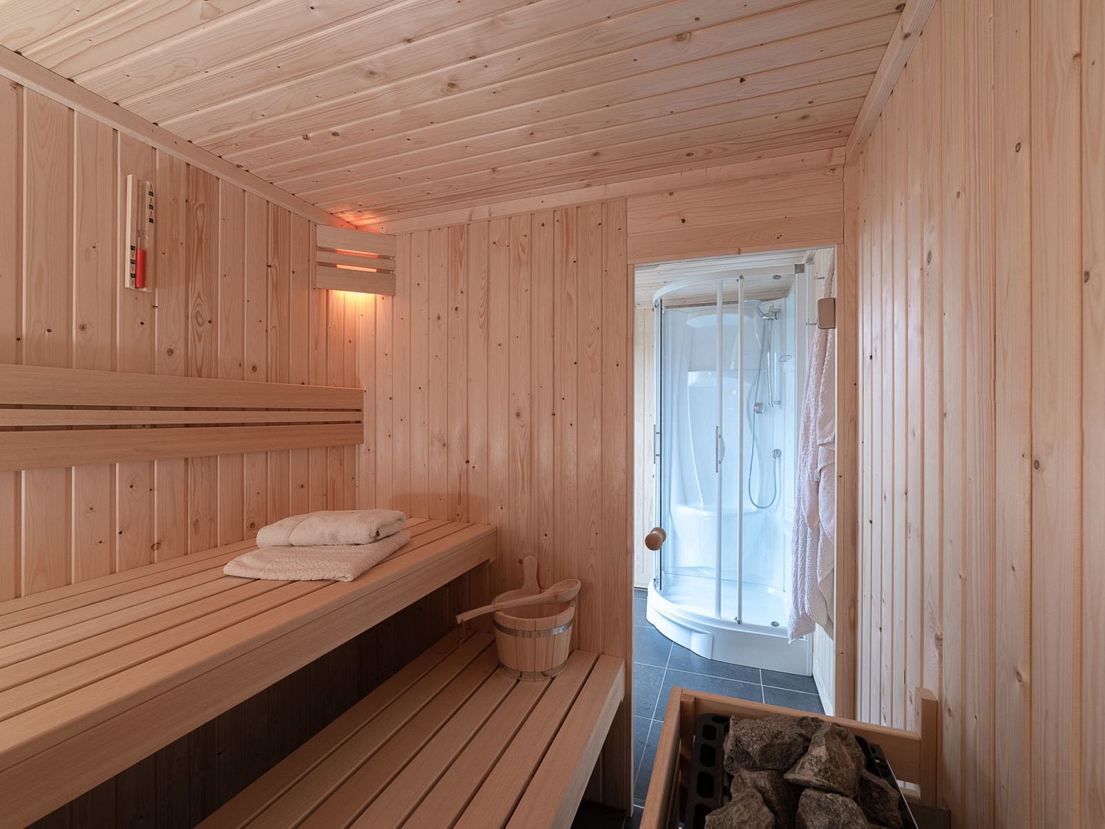 Wooden sauna in Holiday Home Ganuenta, Colijnsplaat, North Beveland for a luxurious wellness experience.