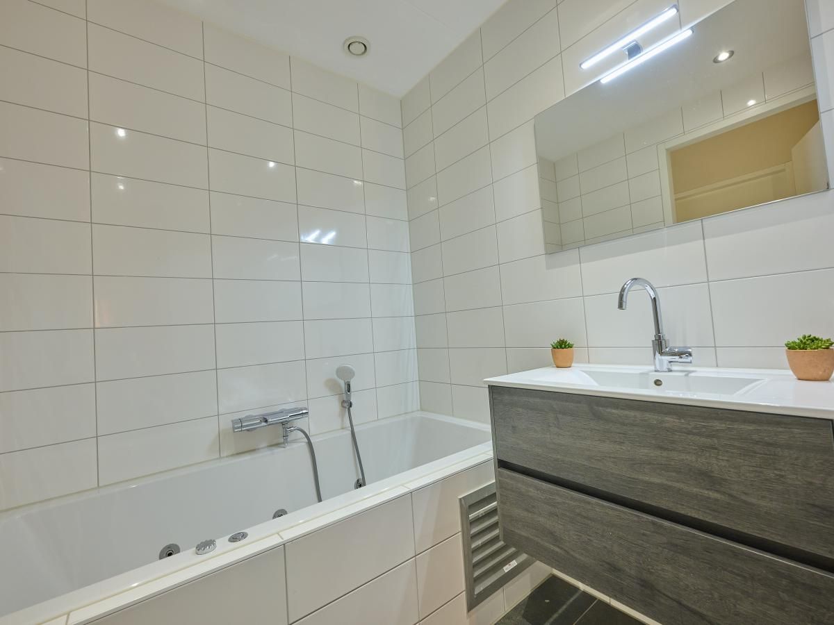 Playground at Sauna Zee vacation home in Colijnsplaat, Zeeland for children to enjoy.