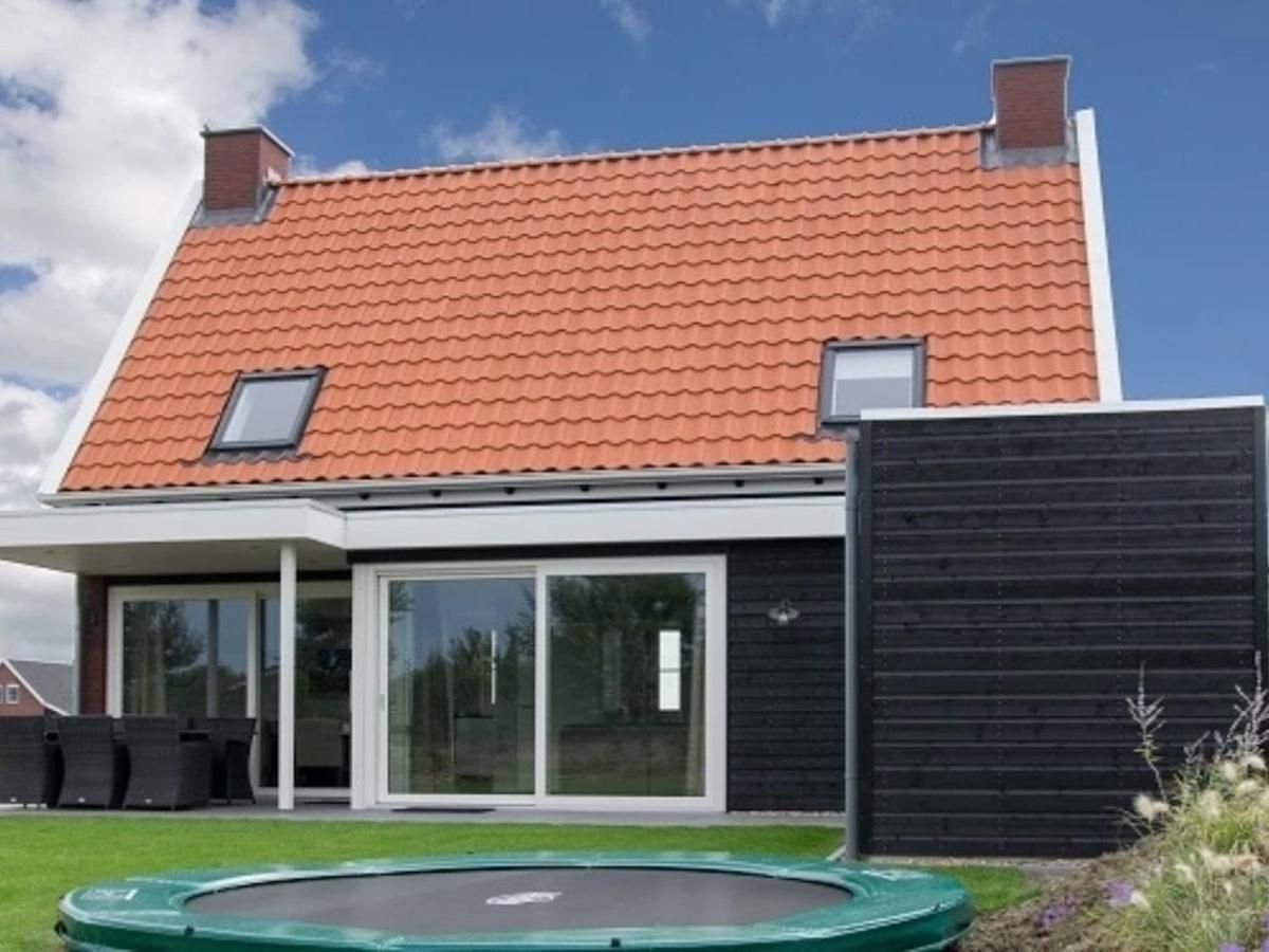 Coast Calm 71 vakantiehuis in Colijnsplaat met ruime tuin en trampoline.