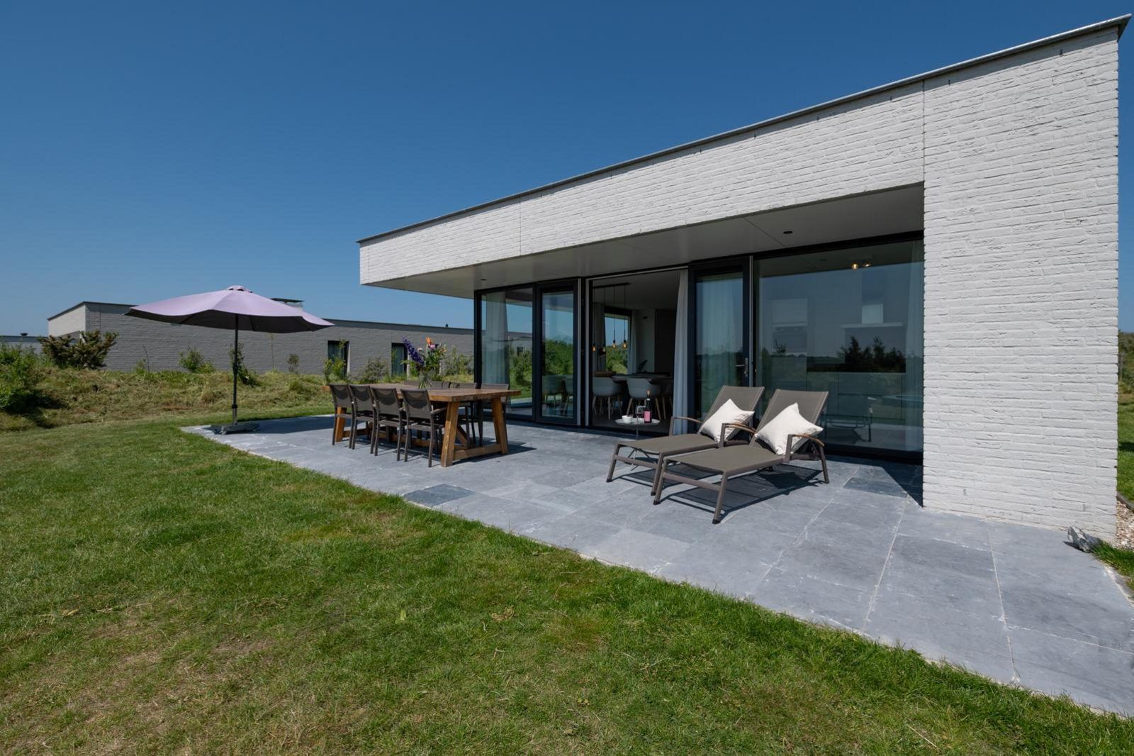 Buitenzicht van Duinvallei 29 | De Groote Duynen, Kamperland. Vakantiehuis in groene omgeving, Noord-Beveland, Zeeland.