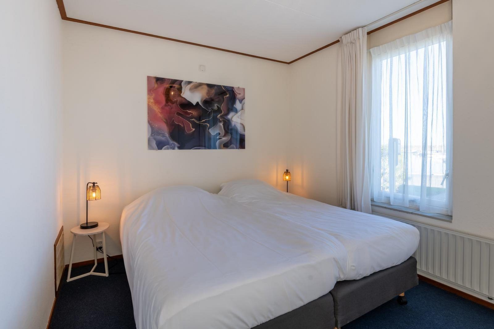 Comfortabele slaapkamer in Sophiaboulevard 15, Roompot Beach Resort, Kamperland, Noord-Beveland. Rustige en serene inrichting.