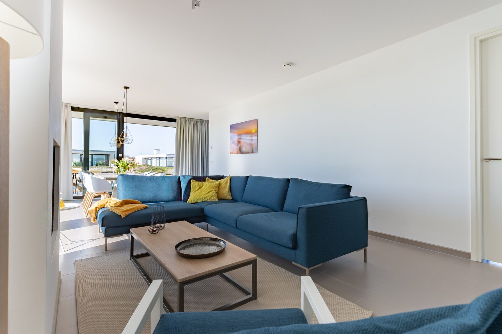 Comfortabele zithoek in Waterlijn 03 | De Groote Duynen, vakantiehuis in Kamperland, Noord-Beveland, met uitzicht.