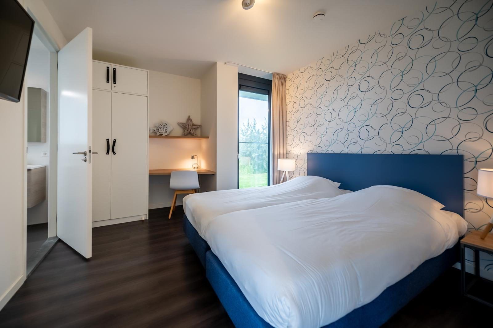 Terrasse und Garten von Duinvallei 09, Ferienhaus in Kamperland, Noord-Beveland, mit Essbereich und sonniger Lage.