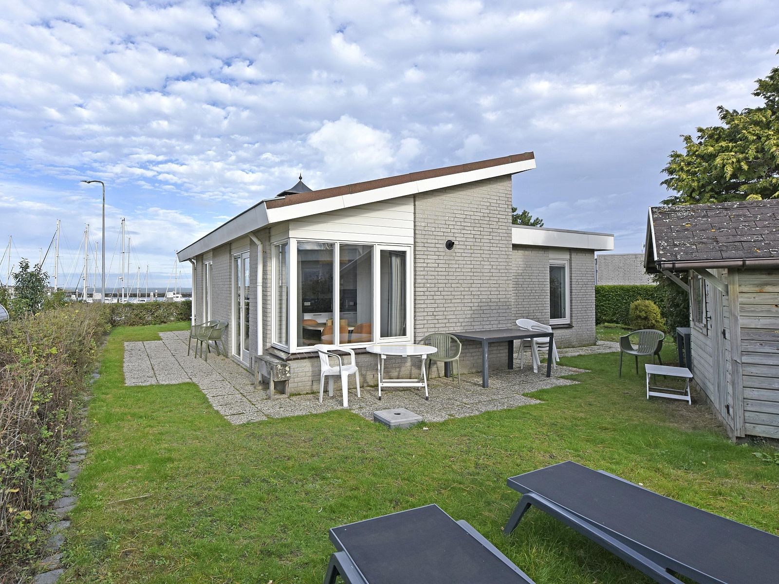 Freistehendes Haus in Kamperland mit Terrasse und Garten, ideales Ferienhaus in Noord-Beveland, Zeeland, mit Blick auf den Jachthafen.