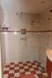 Stylish bathroom of vacation home Mi Casa in Burgh-Haamstede with modern shower facilities.
