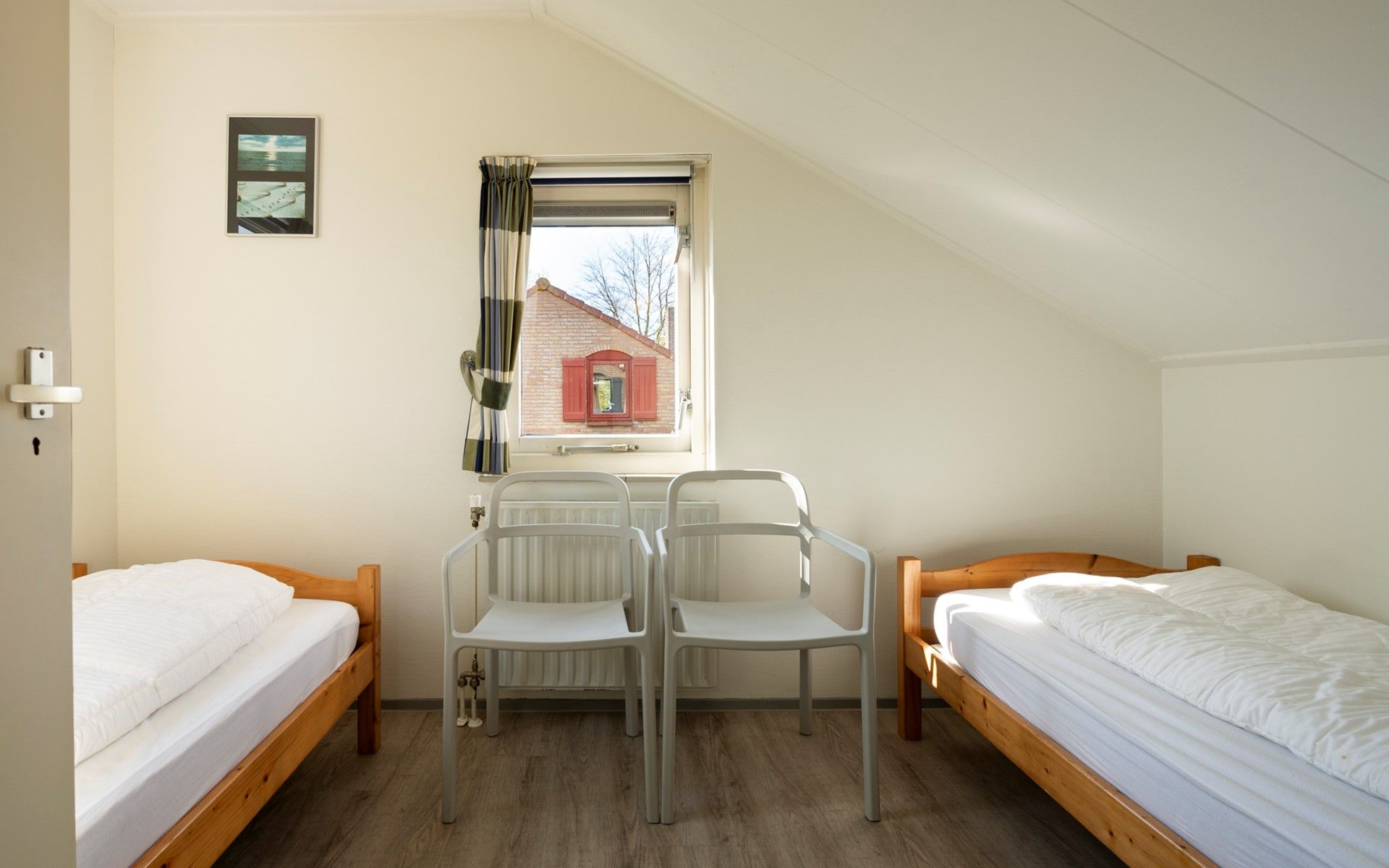 Extra bedroom in Vakantiewoning Schouwse Duin 35, Burgh-Haamstede, with comfortable beds and lots of light in Zeeland.