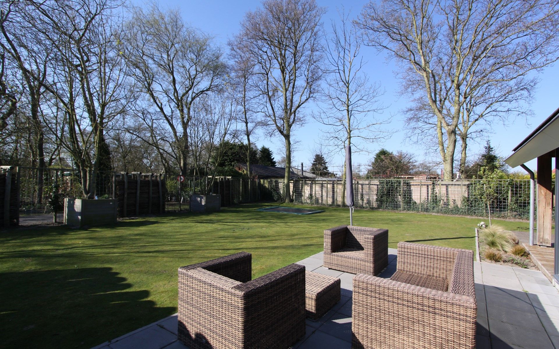 Large garden at Holiday home Horizon 36, 'Sea You' in Renesse, ideal for relaxation.