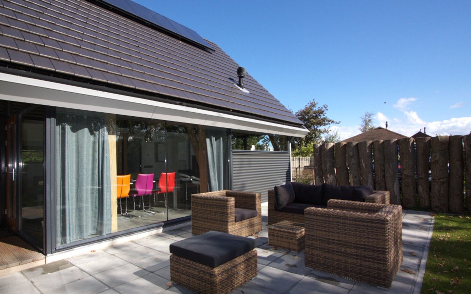 Outdoor area of Holiday home Horizon 36, 'Sea You' in Renesse with comfortable seating.