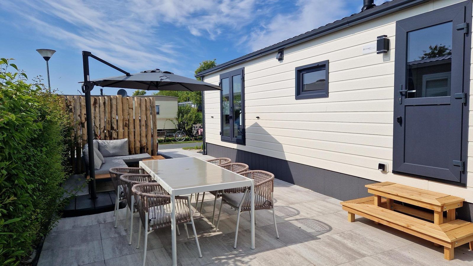 Enjoy the terrace of VZ2326 Holiday Chalet Stern 1866 Renesse, ideal for outdoor dining in Schouwen-Duiveland, Zeeland.