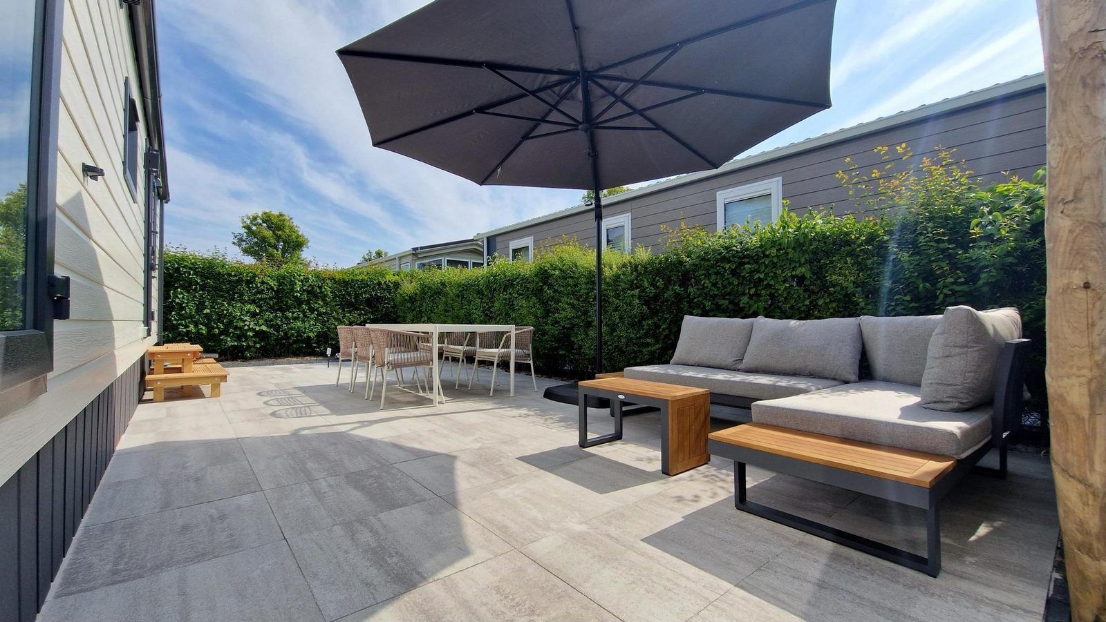 Spacious terrace with comfortable seating at VZ2326 Holiday Chalet Stern 1866 Renesse in Renesse, Schouwen-Duiveland.