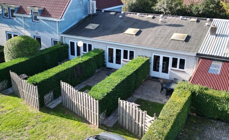 Aufenthalt im Ferienhaus 3 in einer Reihe in Renesse, Schouwen-Duiveland, Zeeland mit einem gemuetlichen Garten und einer Terrasse zur Entspannung.