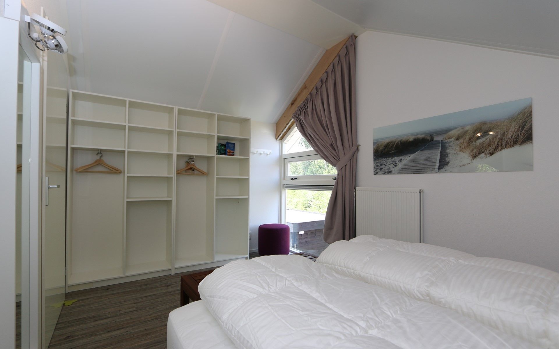 Bright corner of bedroom in Mon Repos, Renesse overlooking the garden