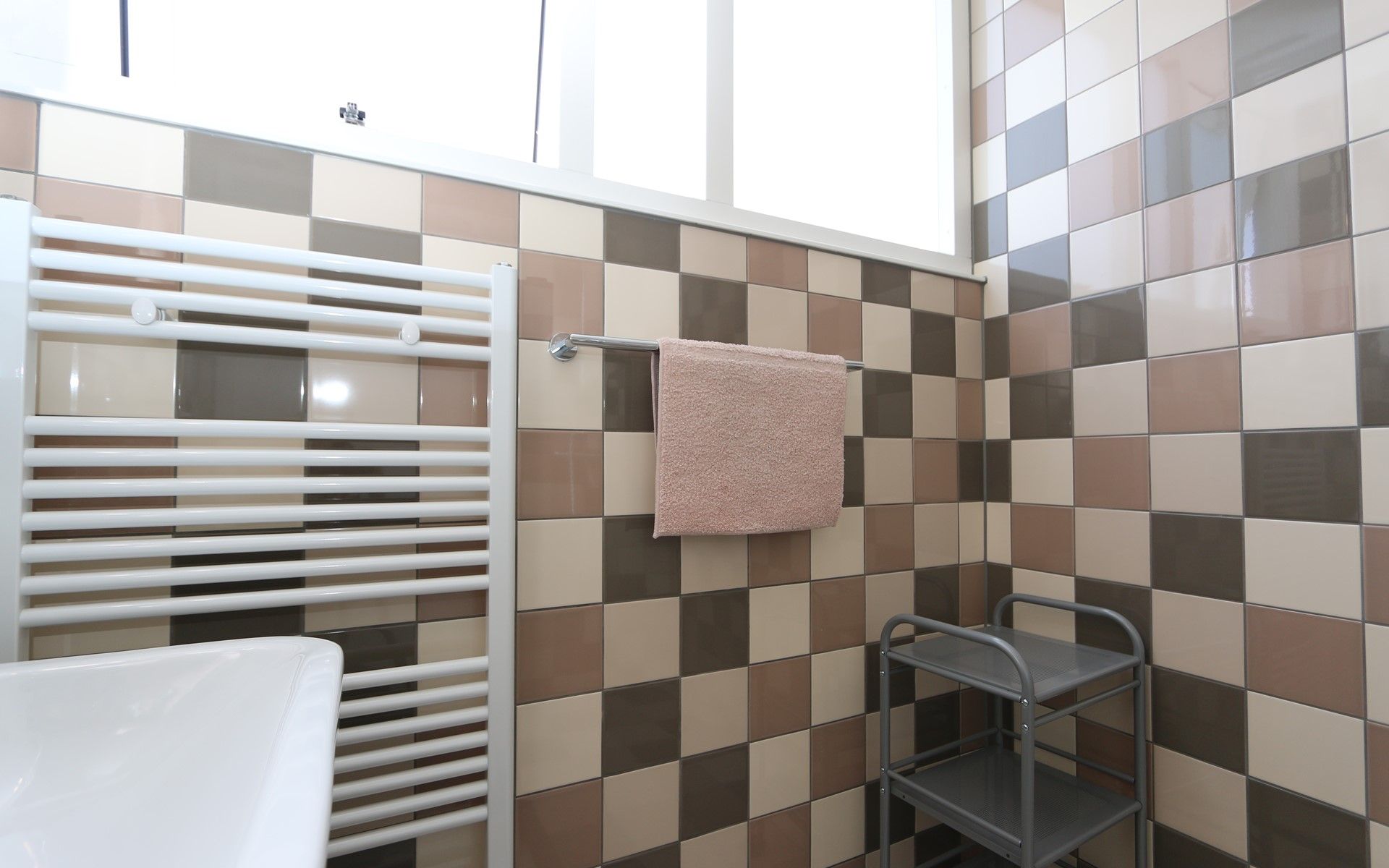 Stylish toilet in Mon Repos, Renesse with modern tiles and sink