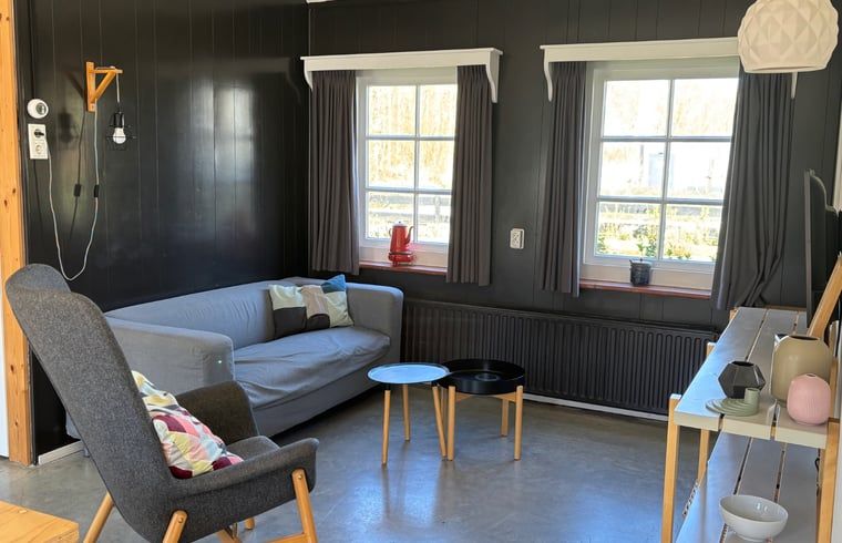 Gezellige woonkamer in Huisje in Koudekerke, vakantiehuis in Walcheren, Zeeland.