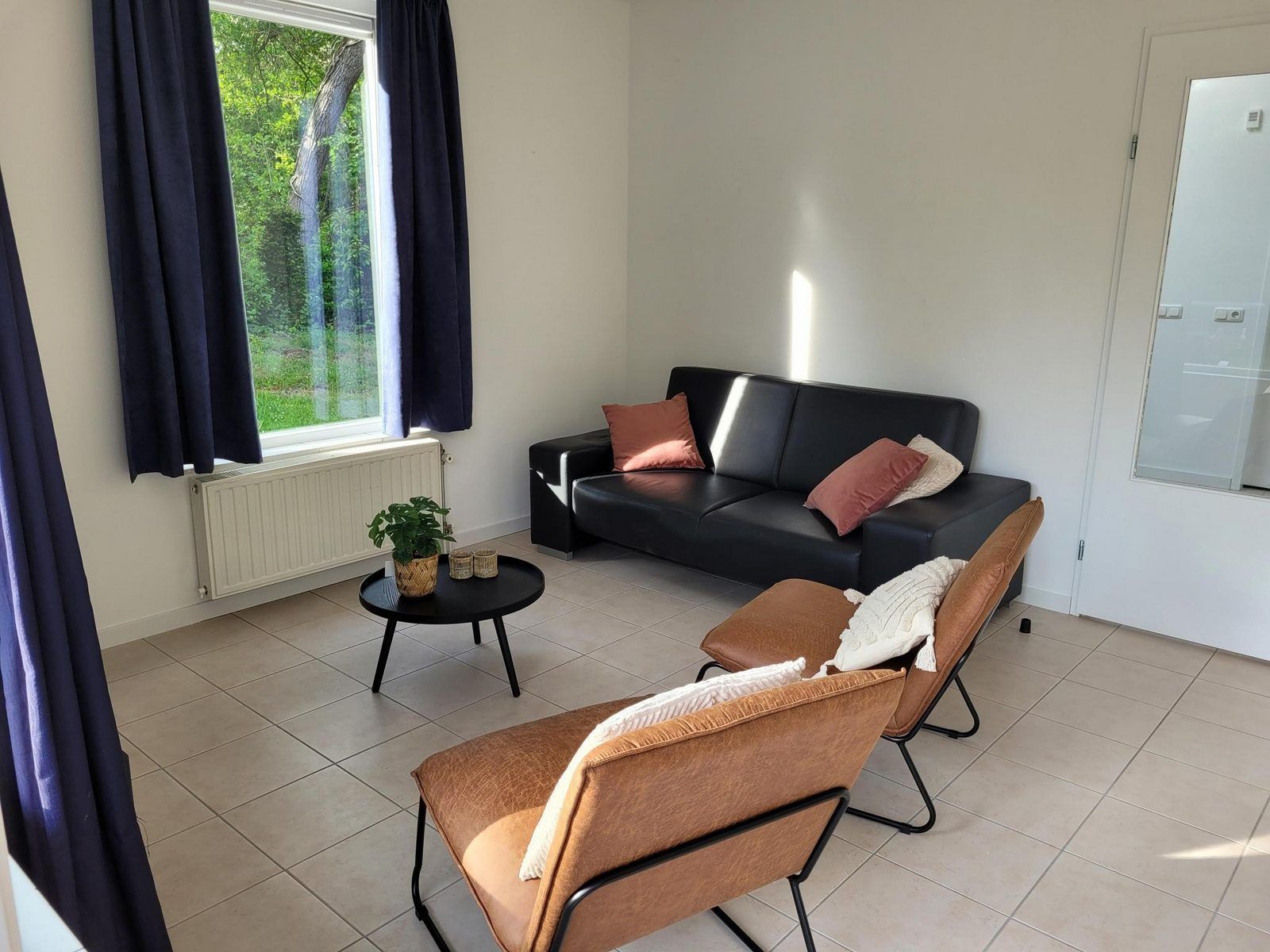 Comfortabele zithoek in VZ2330 Vakantiehuis Oostkapelle, Walcheren, Zeeland.