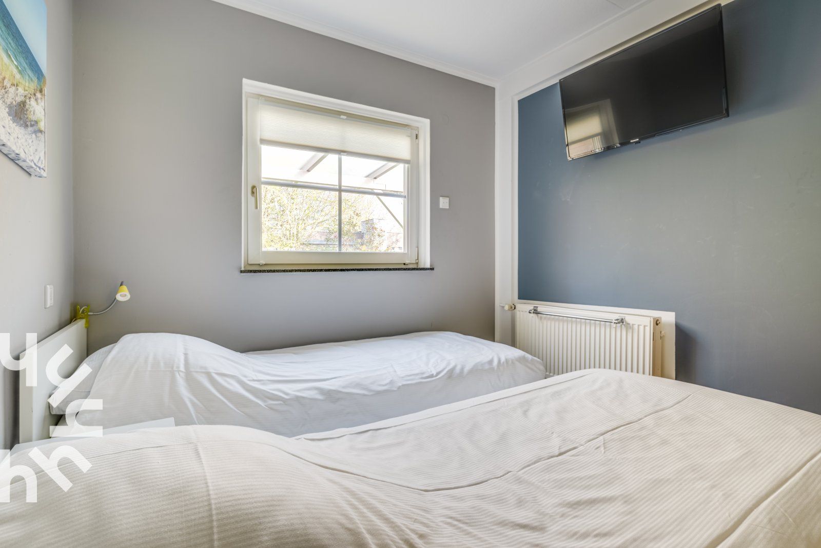 Bedroom with two beds in vacation home ZE742, Oostkapelle, Zeeland.
