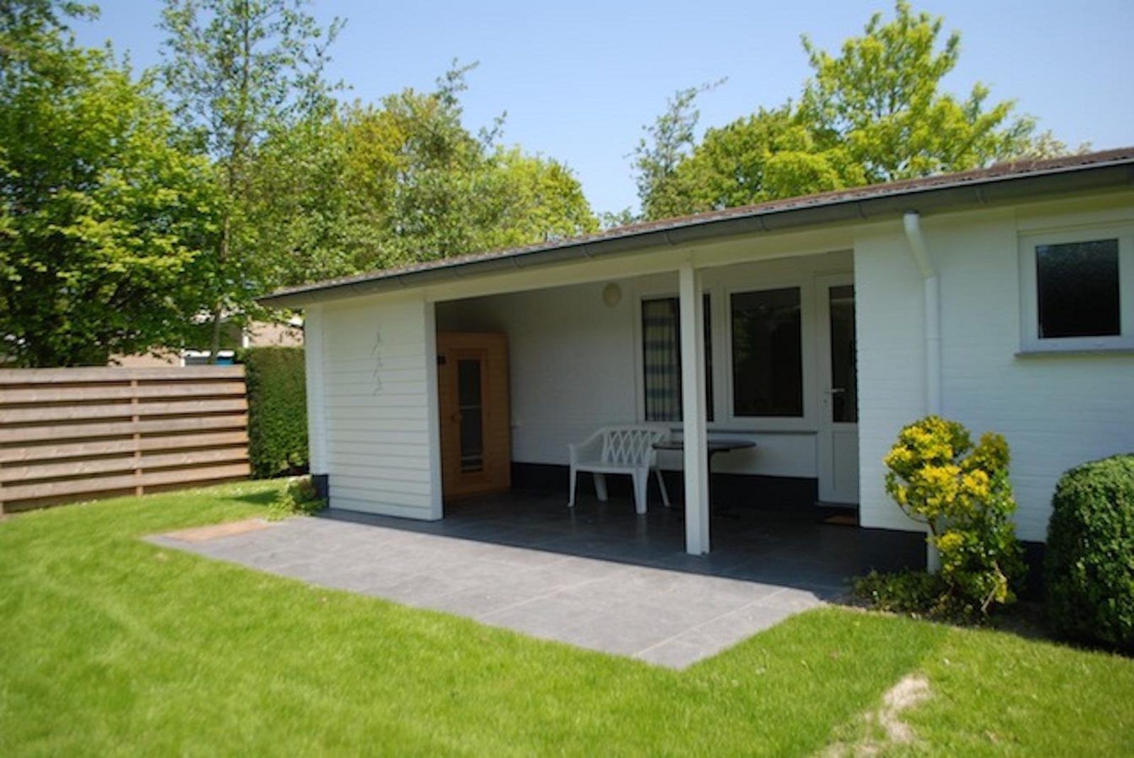 Veranda of VZ1163 Holiday bungalow in Oostkapelle, Walcheren, Zeeland, ideal for relaxation.