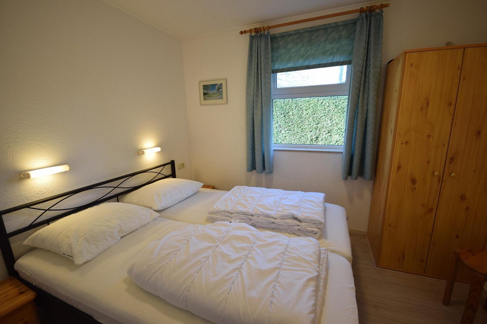 Bedroom with double bed in VZ1163 Holiday bungalow in Oostkapelle, Walcheren, Zeeland, restful interior.