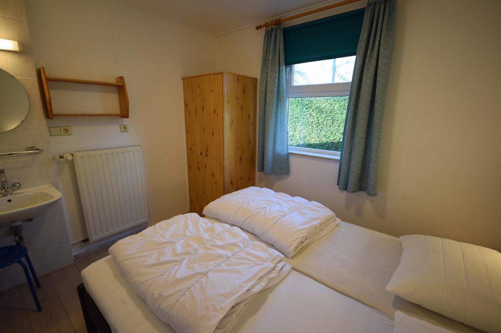 Cozy bedroom in VZ1163 Holiday bungalow in Oostkapelle, Walcheren, Zeeland with lots of natural light.