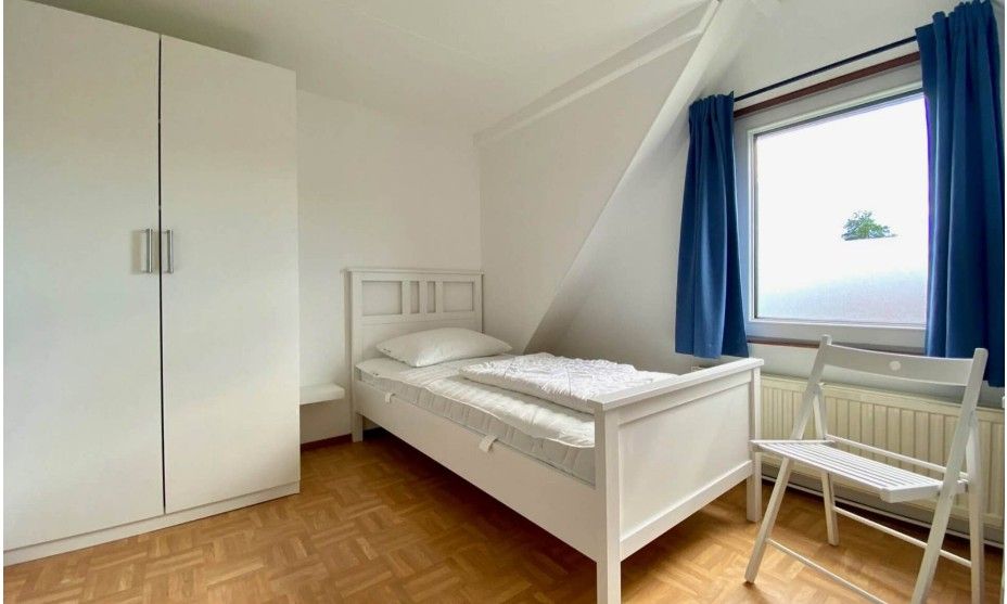 Sfeervolle slaapkamer in Vakantiewoning Oostkapelle, Walcheren. Comfortabel vakantiehuis op 800 m van het strand in Zeeland.