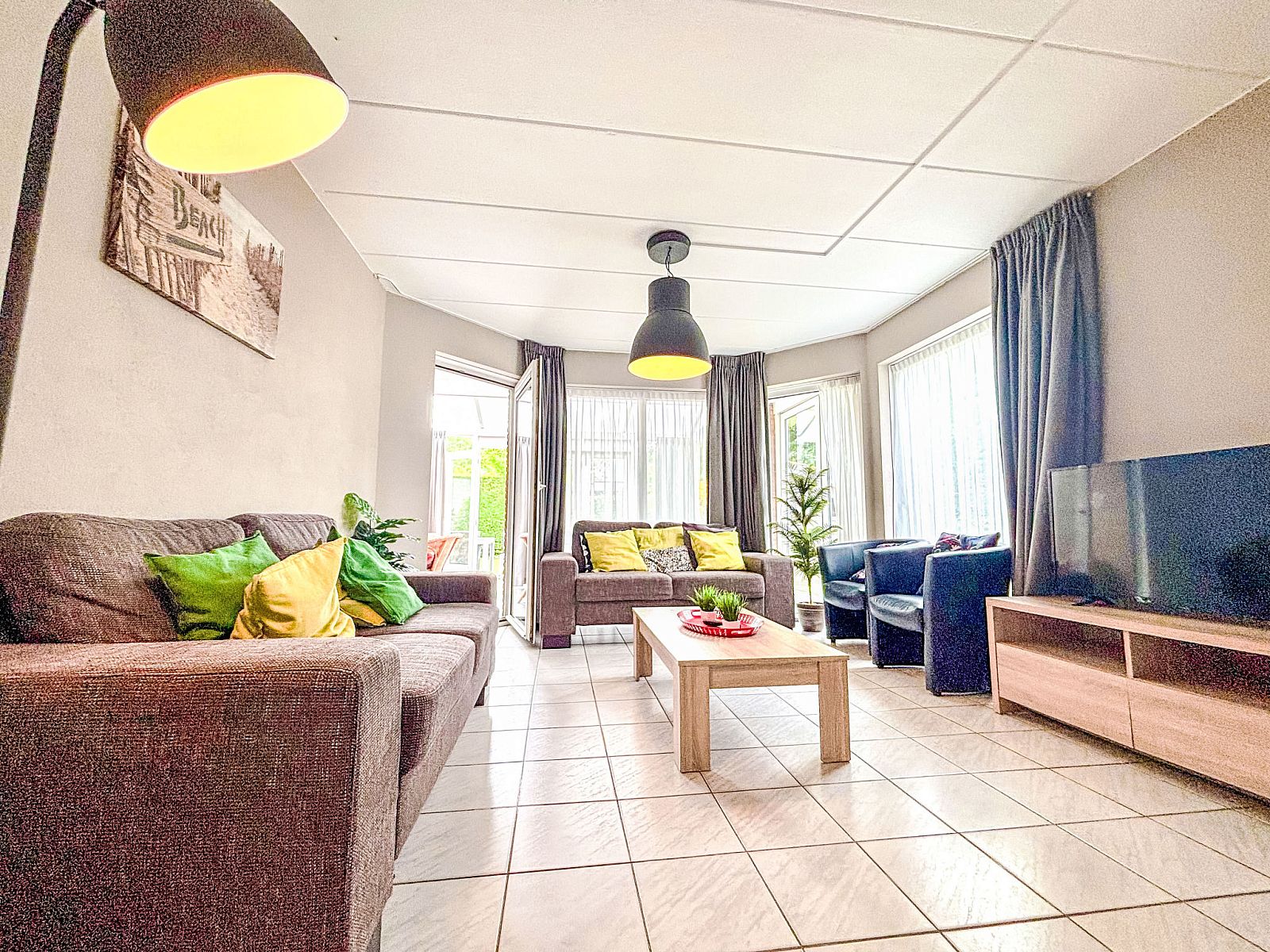 Stylish living room in Apartment Boszicht 1, Oostkapelle, Walcheren, with lots of light.