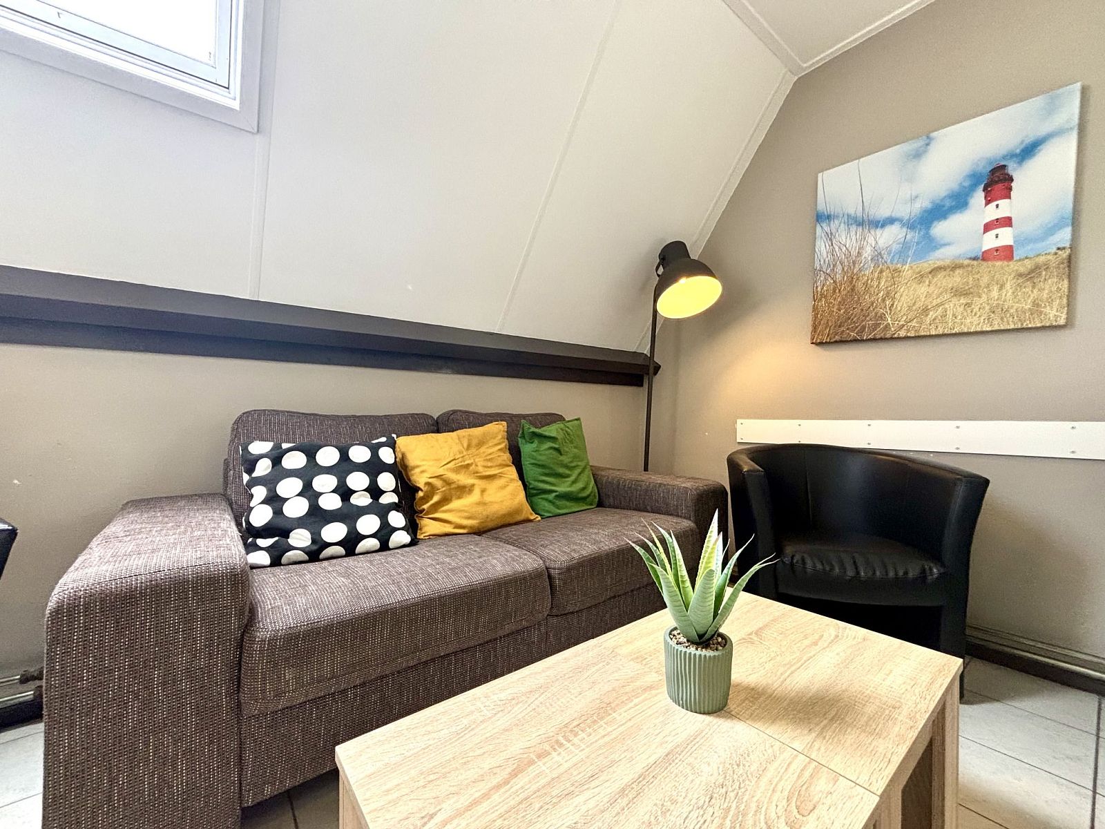 Comfortabele zithoek in Appartement Boszicht 3, Oostkapelle, Walcheren, Zeeland met moderne inrichting.