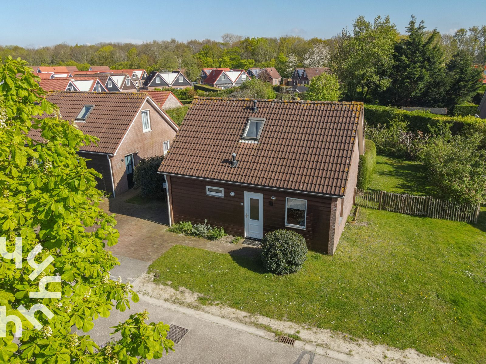 Stylish bedroom with wooden furniture in ZE414, Oostkapelle, Walcheren, Zeeland.