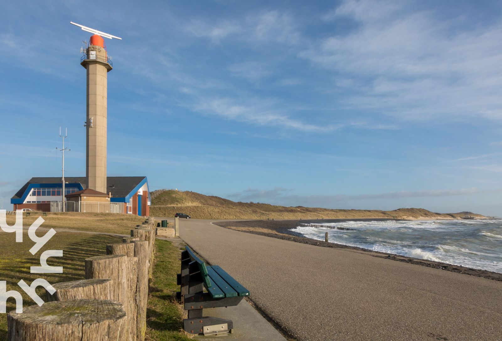 Cyclist at lighthouse in Westkapelle, near vacation home ZE1508, Walcheren, Zeeland.