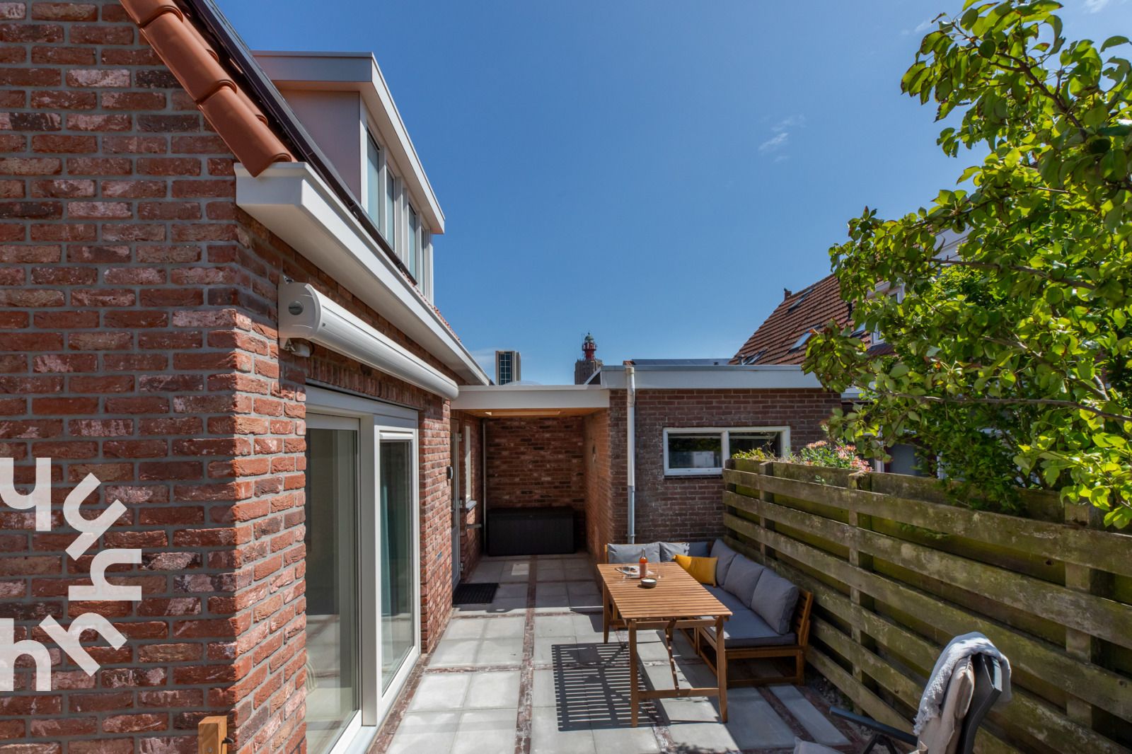 Sunlit terrace of vacation home ZE1508 in Westkapelle, Walcheren, Zeeland.