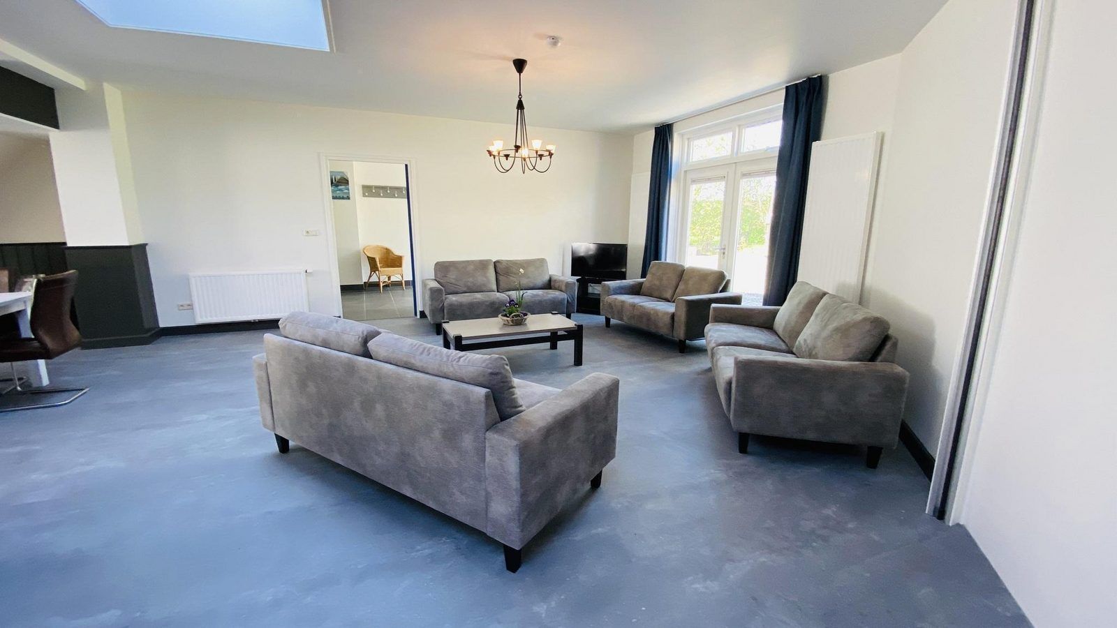 Spacious living room of VZ131 Group accommodation Westkapelle, vacation home in Westkapelle, Walcheren.