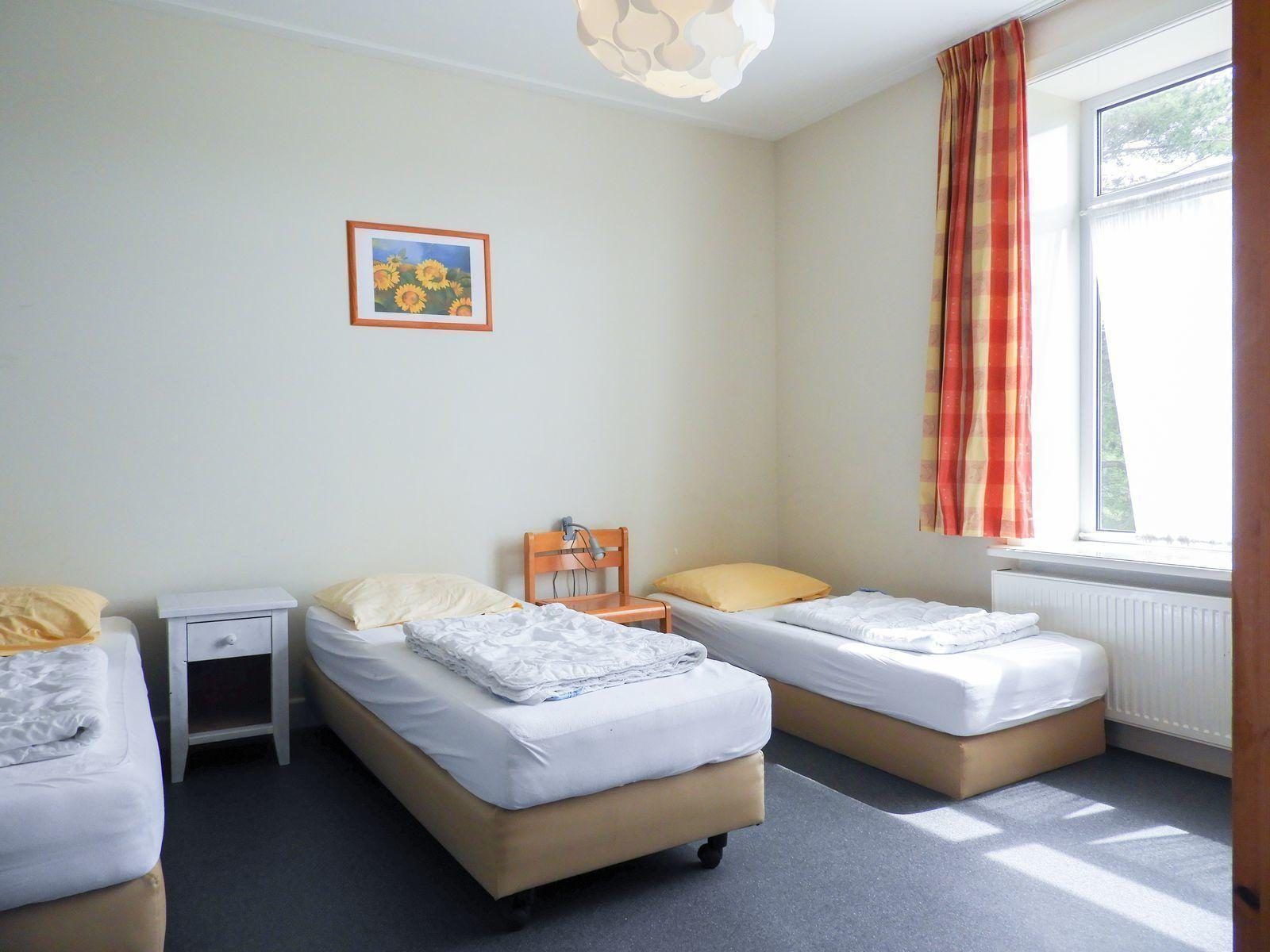 Cozy bedroom of VZ131 Group accommodation Westkapelle, vacation home in Westkapelle, Walcheren.