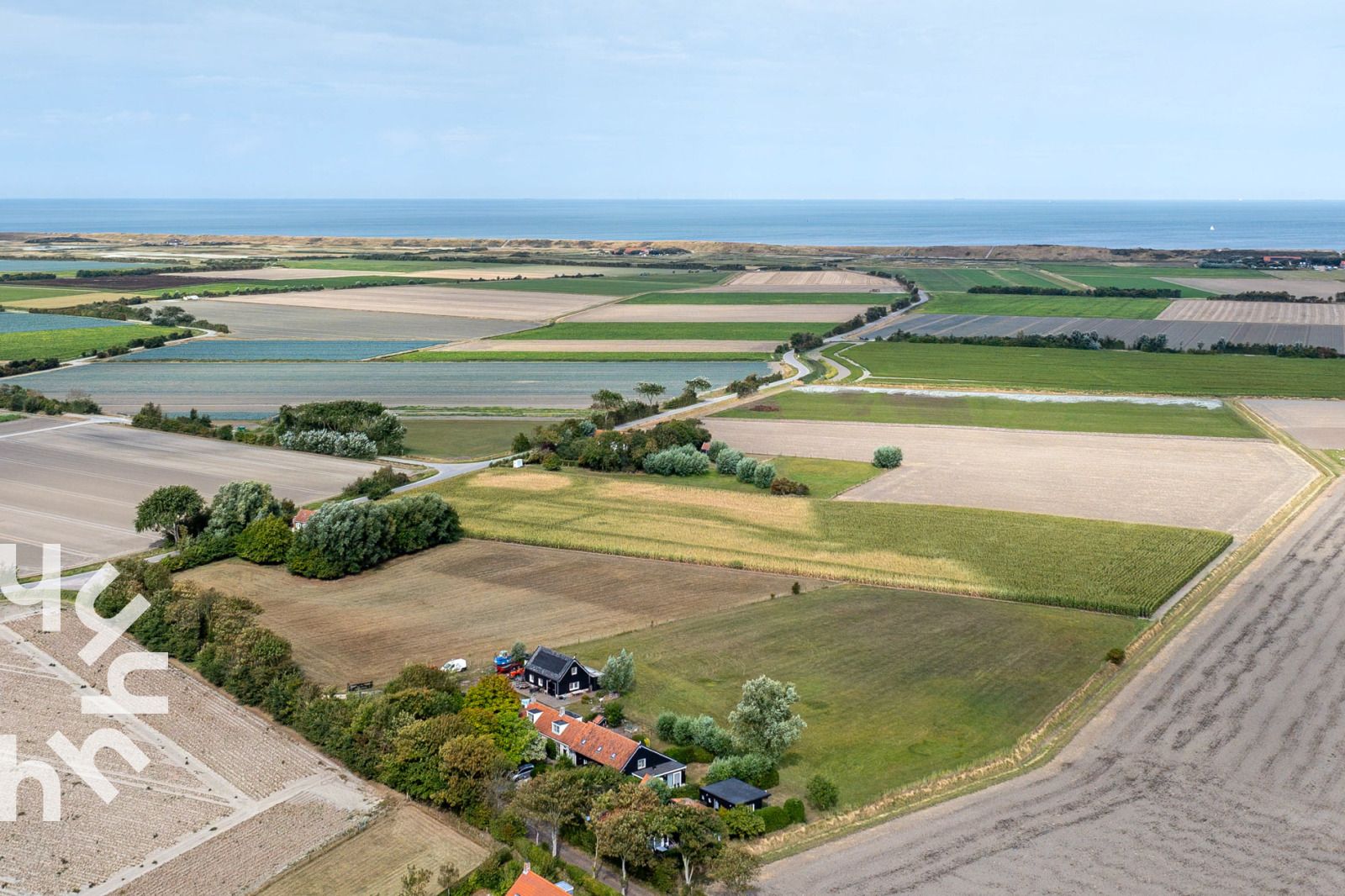 Schlafzimmer mit Einzelbett und Abstellkammer im Ferienhaus ZE257 in Aagtekerke, Walcheren, Zeeland.