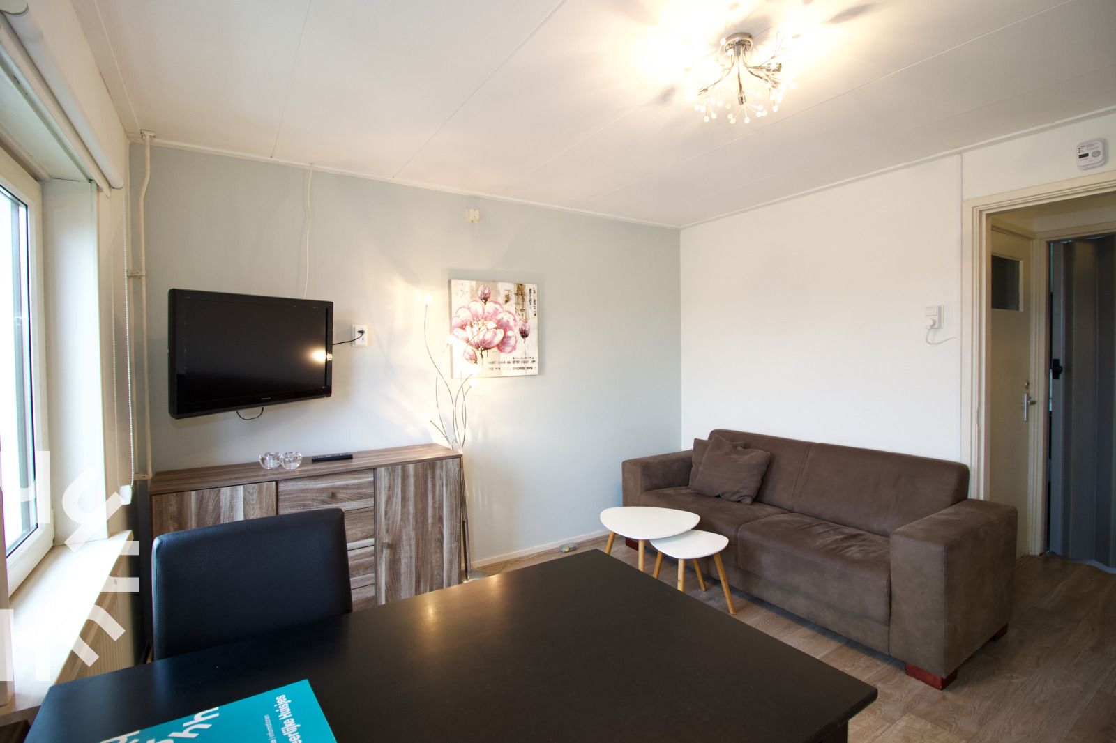 Stairs to upper floor in vacation home ZE303, Zoutelande, Walcheren, with stylish finish.