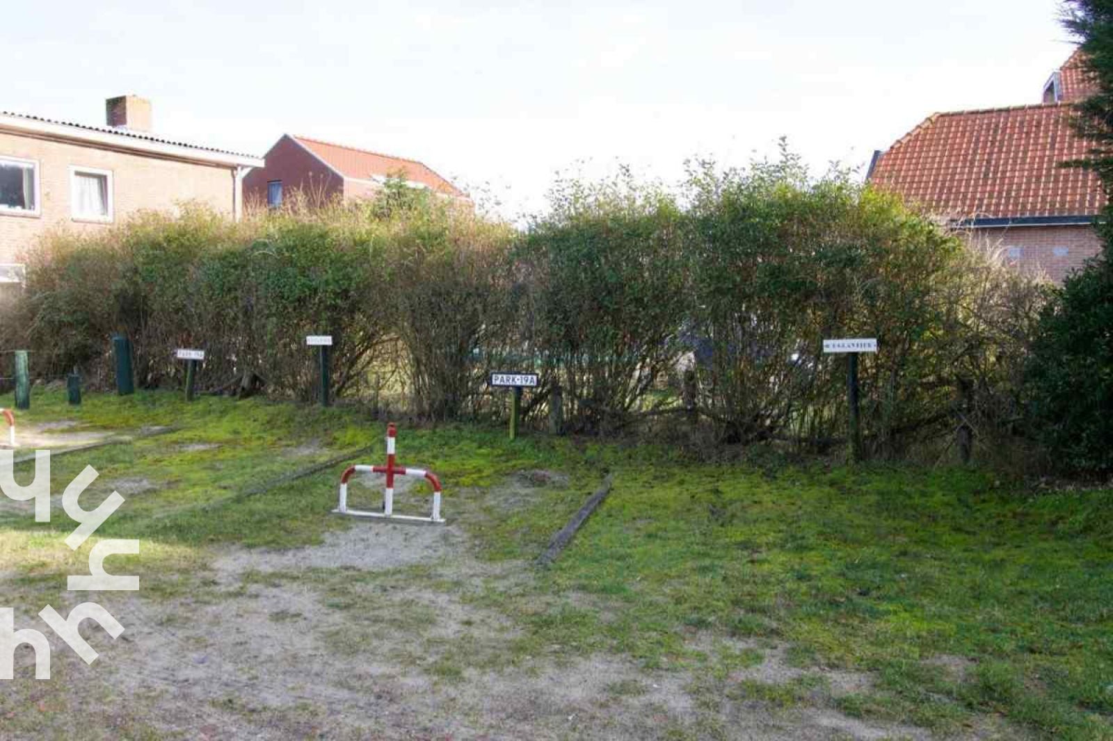 Spacious bedroom in vacation home ZE303, Zoutelande, Walcheren, with two comfortable beds.