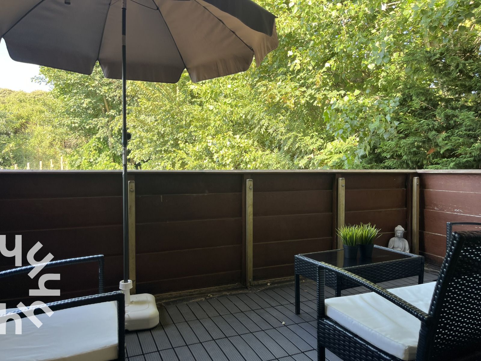 Luchtfoto van het strand nabij vakantiehuis ZE312 in Zoutelande, Walcheren met blauwe zee en zand in Zeeland.