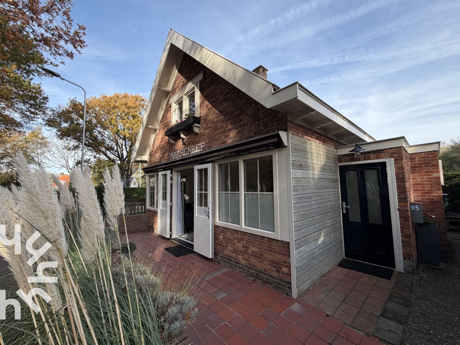 Vacation home ZE1541 in Zoutelande, Walcheren, Zeeland with charming facade and inviting terrace for a relaxing stay.