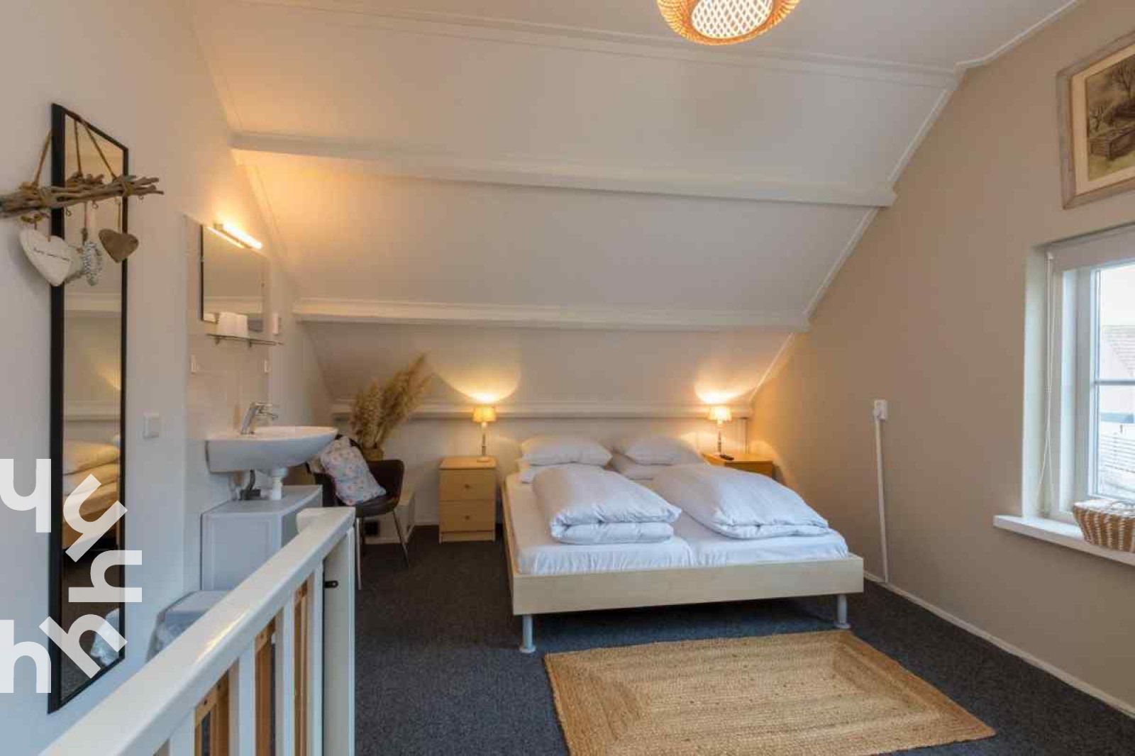 Kitchen and stairs in vacation home ZE1392 in Zoutelande, Walcheren.