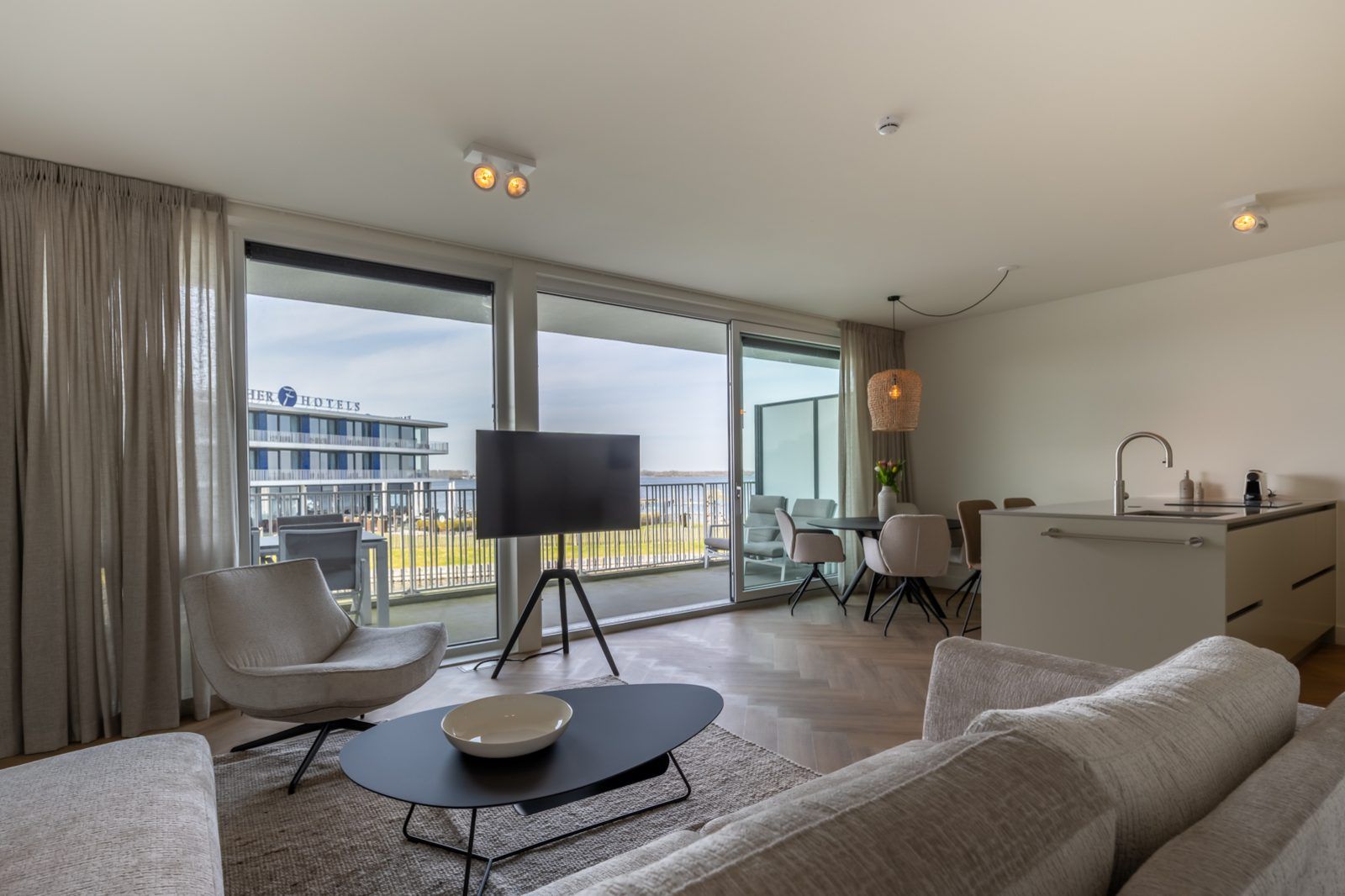 Luxury living room in Lamsoor 47 | Veerse Wende, vacation home in Arnemuiden, Walcheren, Zeeland overlooking water.