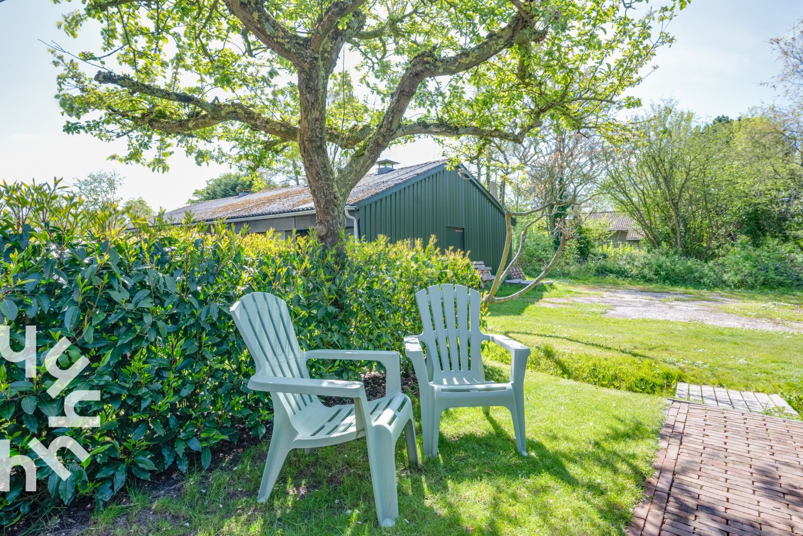 Garden with seating at vacation home ZE1152 in Veere, Walcheren, Zeeland.