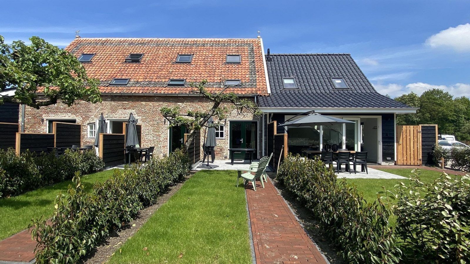 Exterior of VZ1022 Holiday apartment in Veere, Walcheren, Zeeland with an inviting terrace.