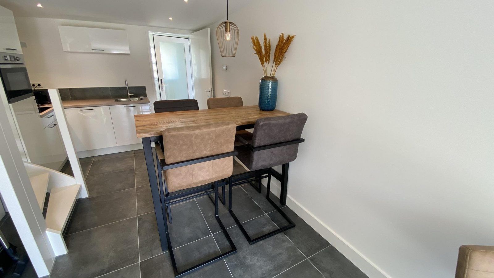 Dining area in VZ1022 Holiday apartment in Veere, Walcheren, Zeeland with modern furnishings.